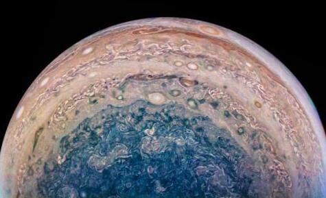 NASA公布木星南极美图 蓝色漩涡壮丽夺目(图)